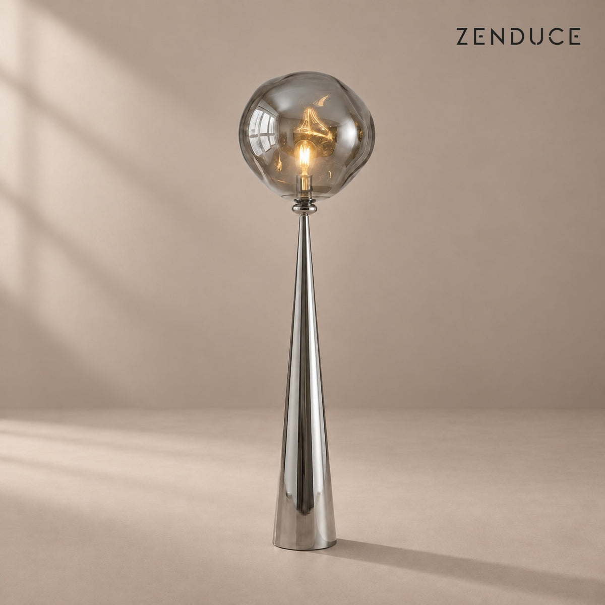 ELUNE Chrome Silver acrylic floor lamp with matching reflective conical pedestal and natural shadow