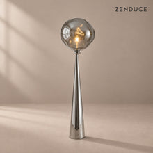 ELUNE Chrome Silver acrylic floor lamp with matching reflective conical pedestal and natural shadow