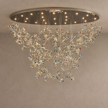 ENCHANTED cascading crystal flower chandelier with a mirrored oval ceiling plate on mushroom taupe