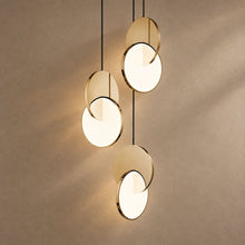 ENTWINED lighting on mushroom taupe plaster with natural shadows