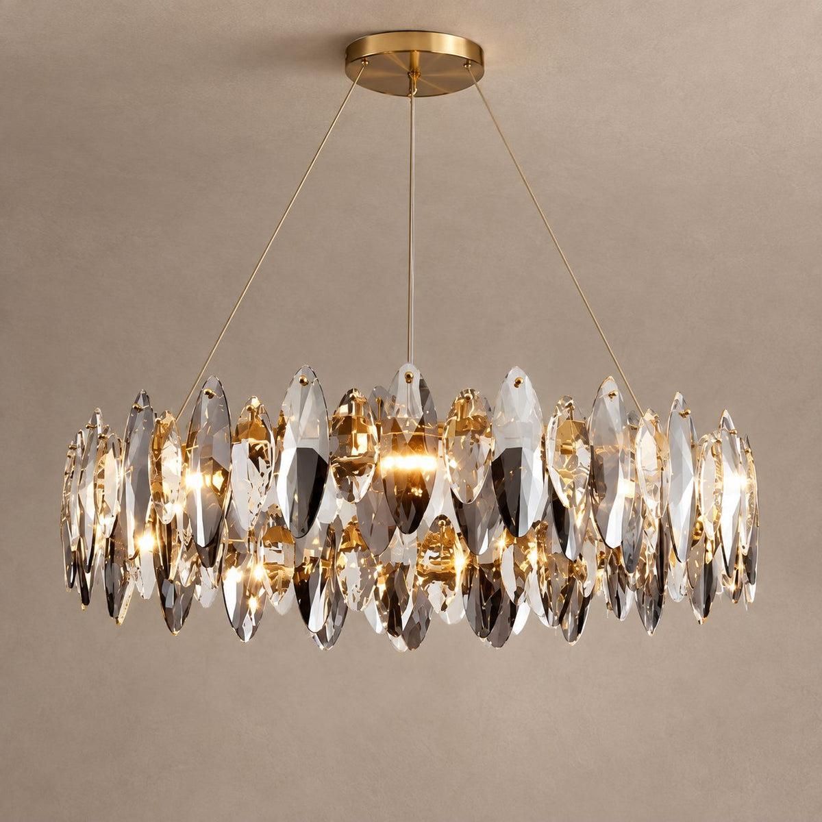 ETHEREAL brass chandelier with faceted crystal drops on mushroom taupe plaster