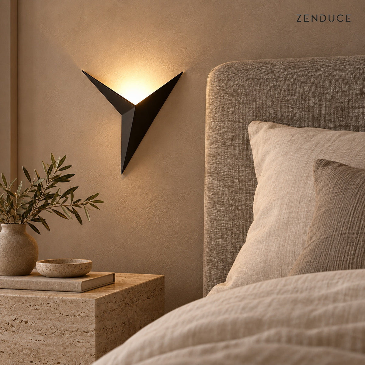 EZIA warm LED wall light beside a linen upholstered bed