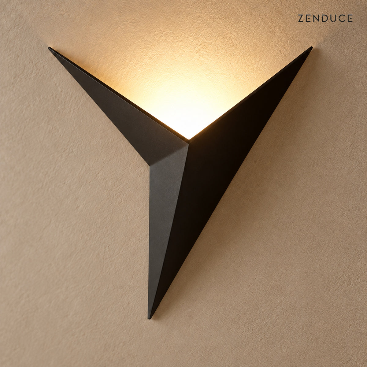 Close view of the EZIA black sheet-metal folds and concealed warm LED