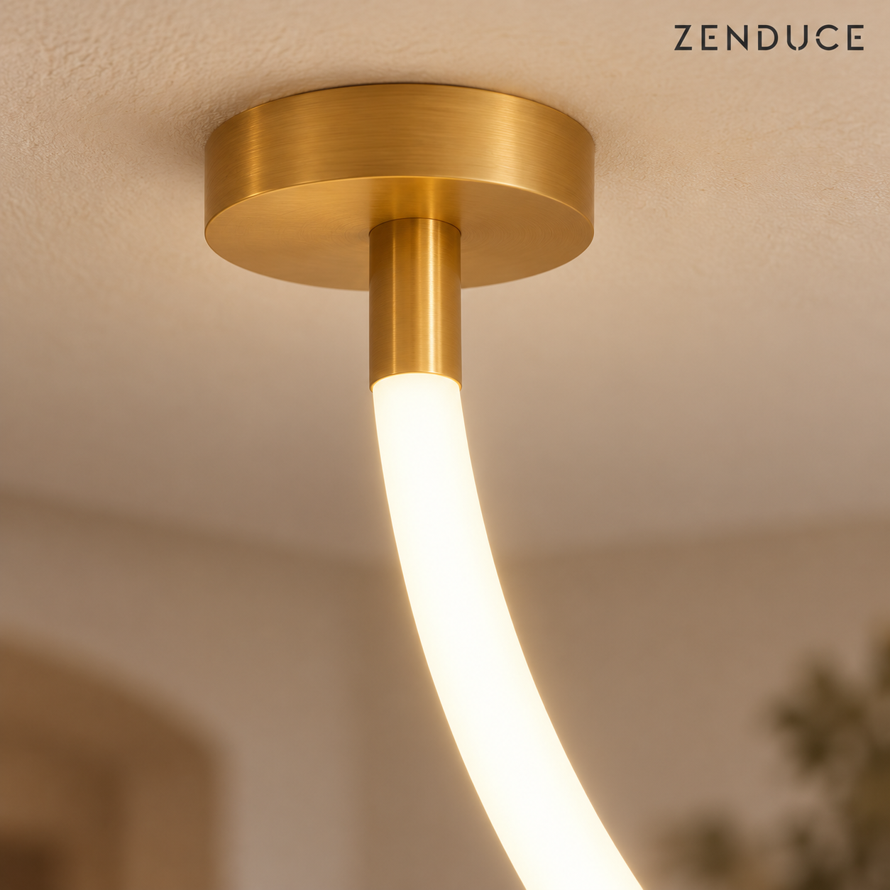 FENNA close-up of brushed gold ceiling canopy, short connector and round opal silicone LED tube