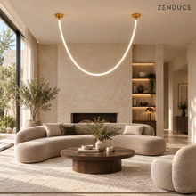 FENNA gold single-tube chandelier in a contemporary living room
