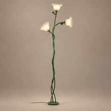 FLORAVA green floor lamp with three white flower shades on a mushroom taupe background