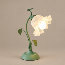 FLORIEL dimmable flower table lamp on a mushroom taupe background