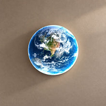 GAIA lighting on a mushroom taupe background with natural shadows