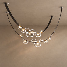 GIRDLE (OPEN BOX) lighting on a mushroom taupe background with natural shadows