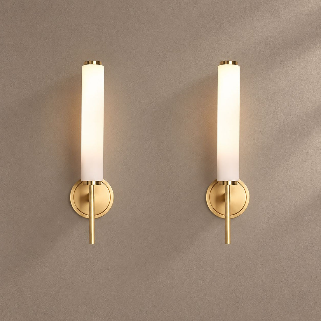 GLACY lighting on a mushroom taupe background with natural shadows