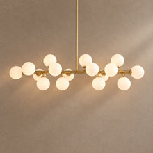 GLASS GLOBES on mushroom taupe background with natural shadows