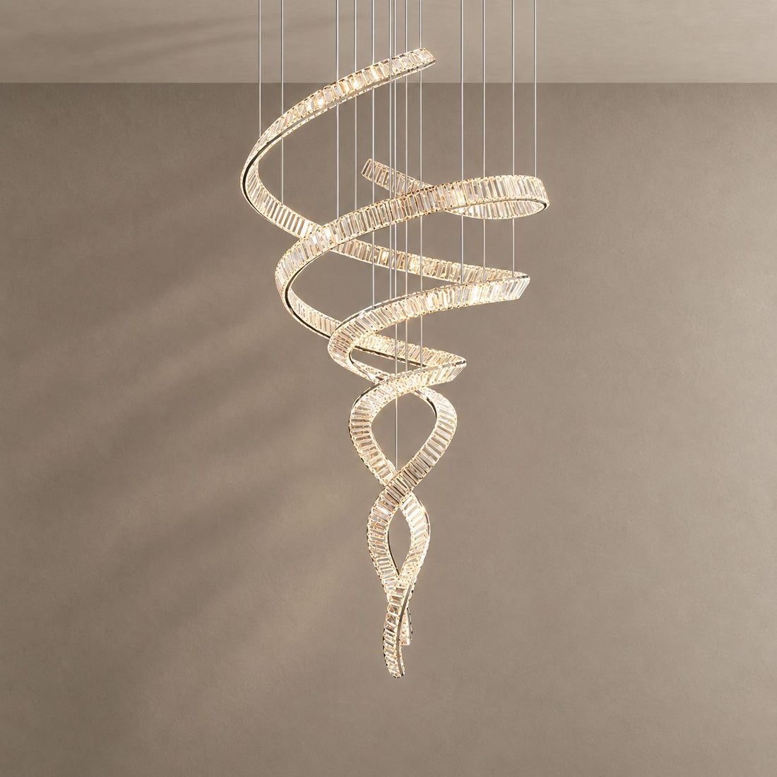 HELIX chandelier on mushroom taupe with soft natural shadows