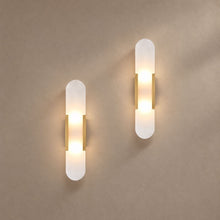 IRON lighting on a mushroom taupe background with natural shadows