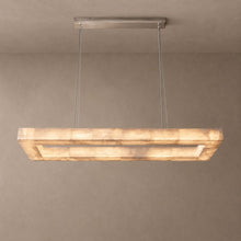IVORY on mushroom taupe background with natural shadows