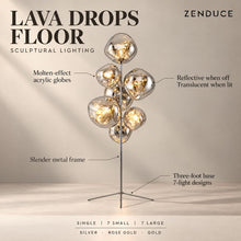 LAVA DROPS FLOOR feature guide showing molten-effect acrylic globes, reflective finish, metal frame and three-foot base