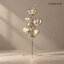 LAVA DROPS FLOOR sculptural globe floor lamp with reflective shades and a slender metal stand
