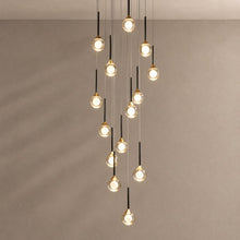 LOIMATA chandelier on mushroom taupe with soft natural shadows