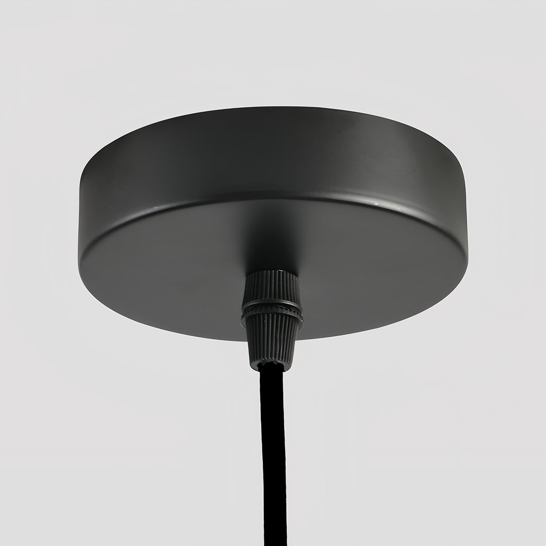 FELLA - Close view of the black round ceiling canopy