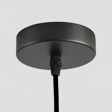 FELLA - Close view of the black round ceiling canopy
