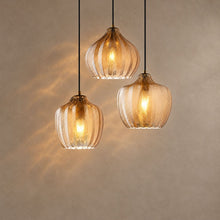 MONA lighting on a mushroom taupe background with natural shadows