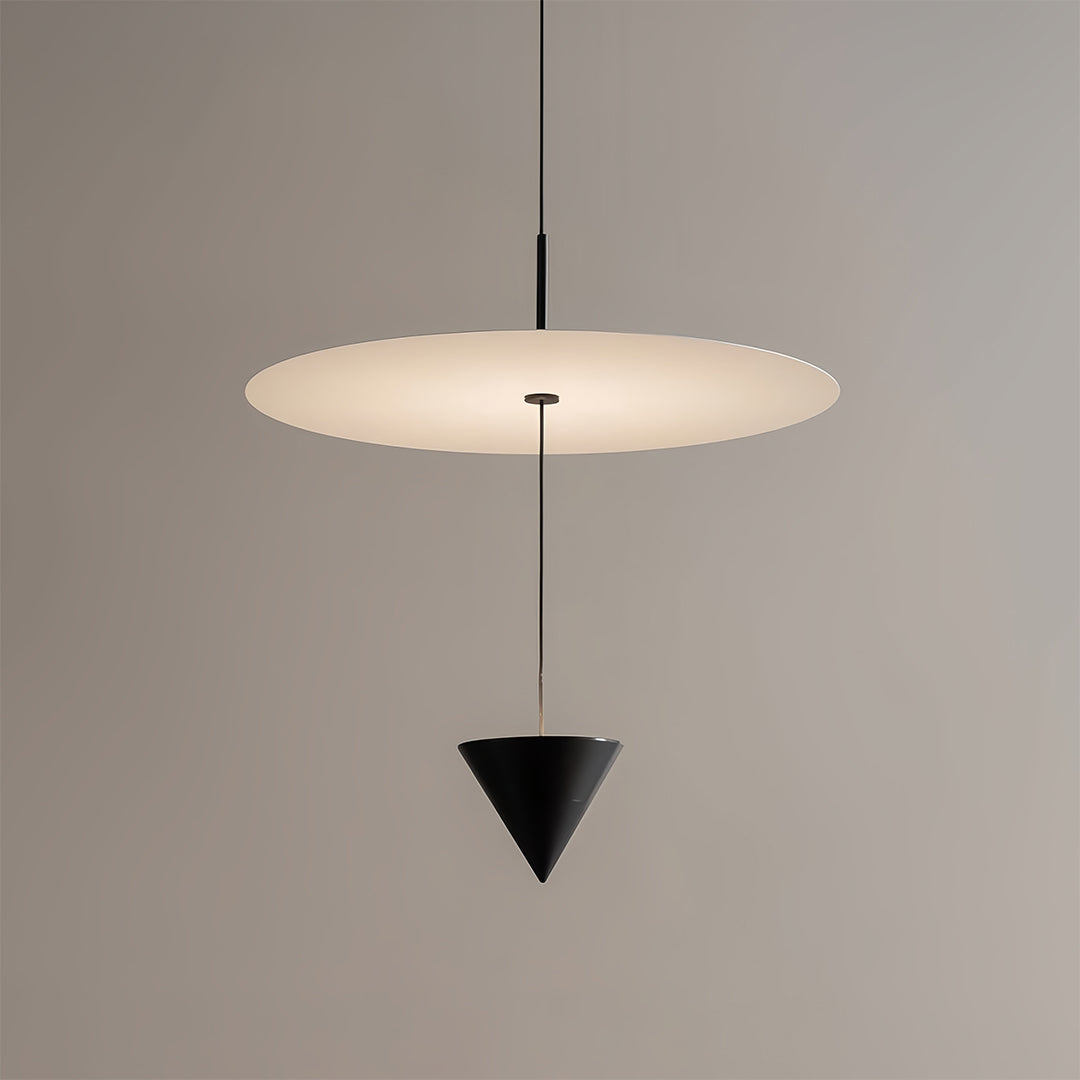 CONIA - Single white disc and black cone pendant against a plain background