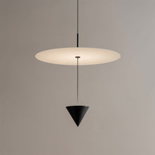CONIA - Single white disc and black cone pendant against a plain background