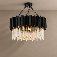 MYSTIQUE round black chandelier with clear crystal rods, hung on chains, lit