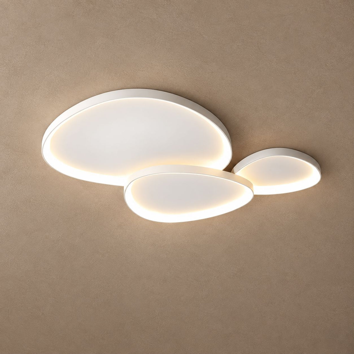 NIVARA lighting on a mushroom taupe background with natural shadows