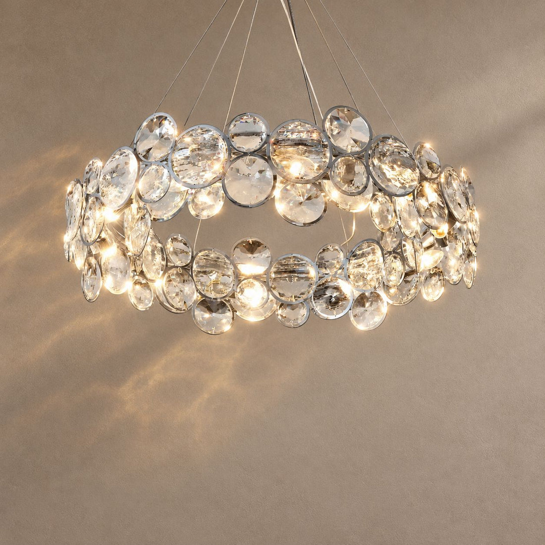 NOA lighting on a mushroom taupe background with natural shadows