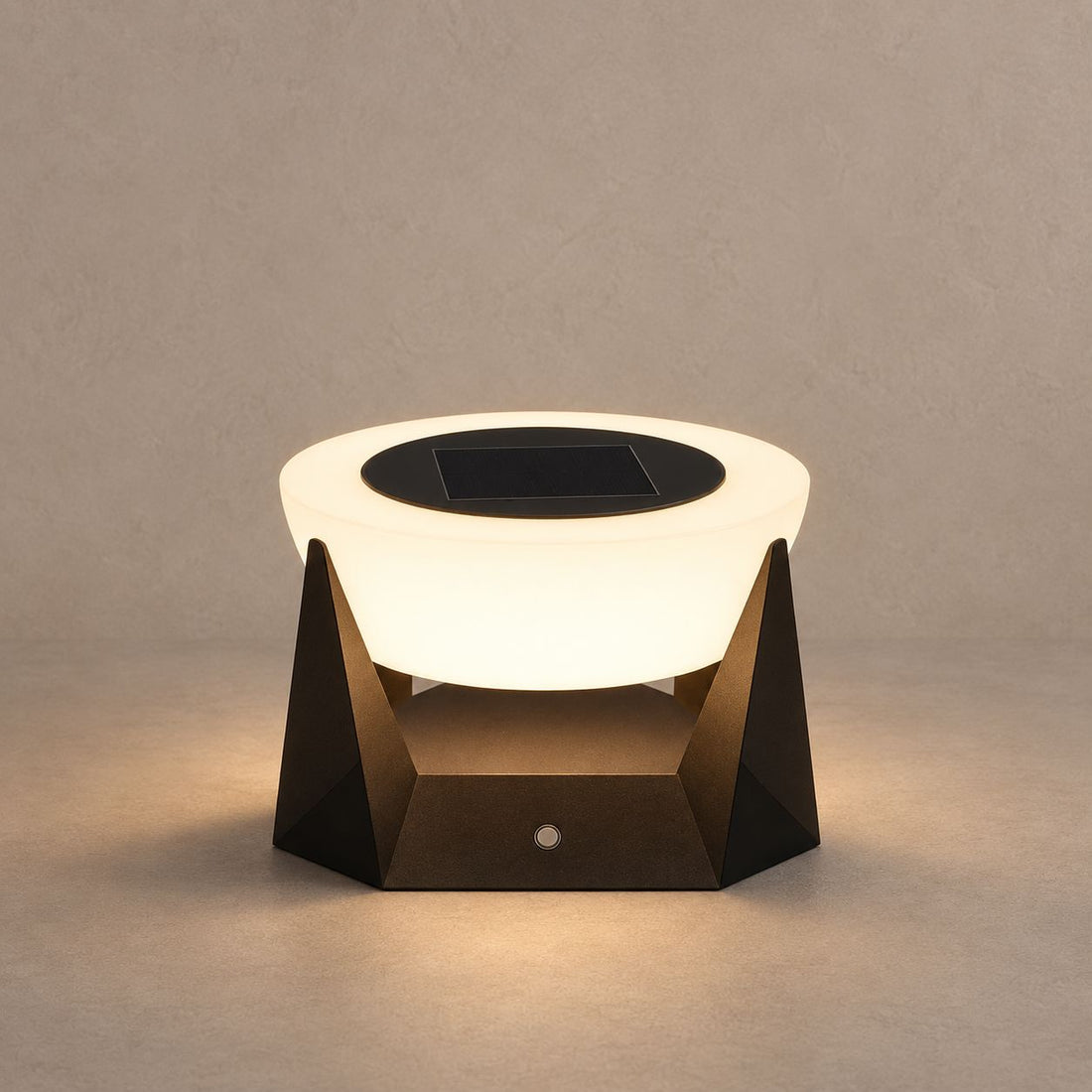 NOCTARA solar outdoor lamp with a glowing round diffuser and dark angular base on mushroom taupe