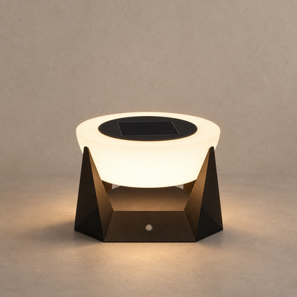 NOCTARA solar outdoor lamp with a glowing round diffuser and dark angular base on mushroom taupe