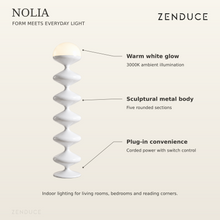 NOLIA feature guide highlighting 3000K warm white light, sculptural metal body, and plug-in power