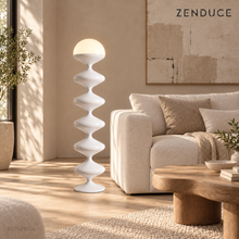 NOLIA white floor lamp visualized beside a cream linen sofa in a sunlit living room