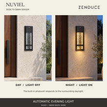 NUVIEL Dusk to Dawn Sensor shown in the same limestone entrance by day with the light off and at night with warm bubble-glass illumination.
