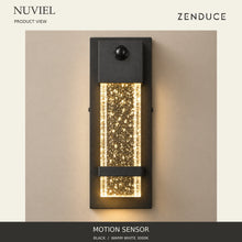 NUVIEL Motion Sensor front product view, showing the correct sensor, black rectangular backplate, clear bubble-glass prism and single lower retaining band.
