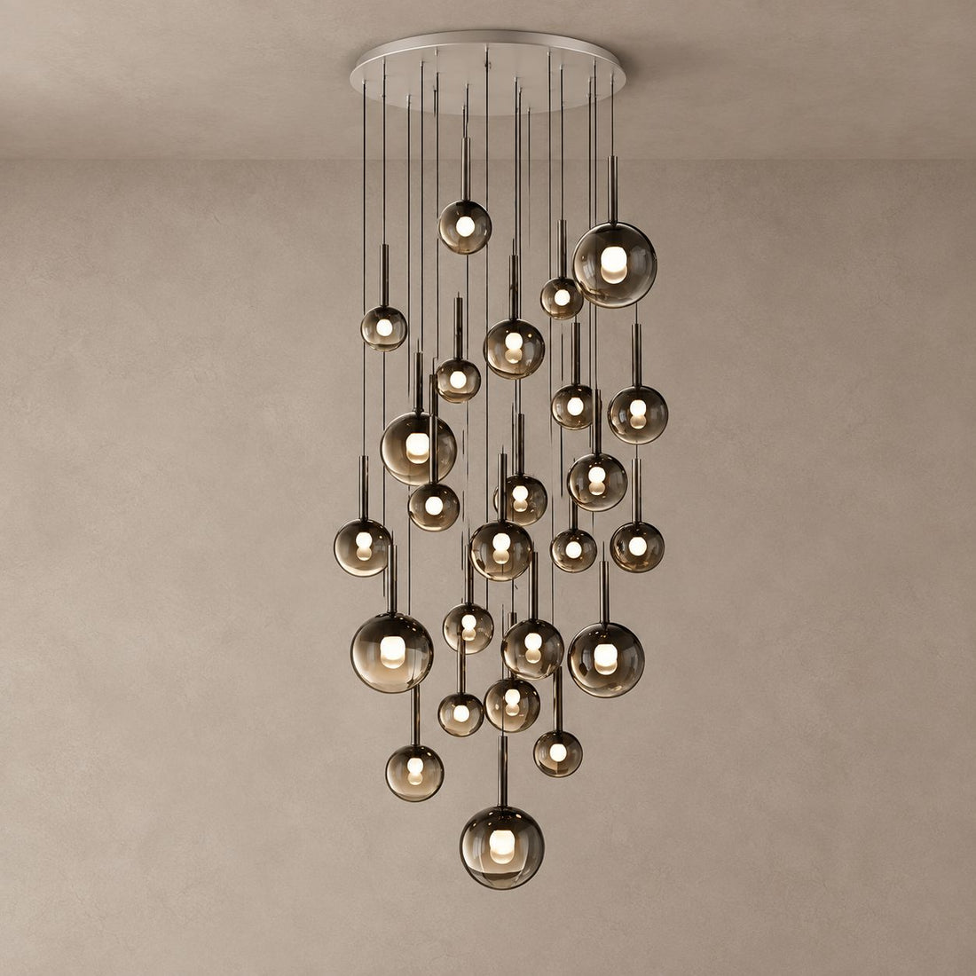 OPHIRA chandelier with 25 smoky glass globes cascading from a round ceiling canopy on mushroom taupe