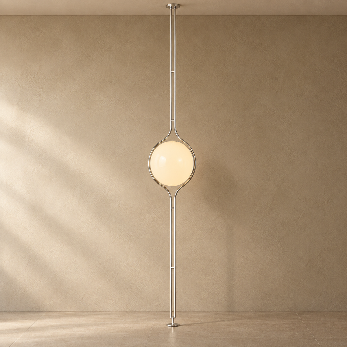 ORELIA silver floor-to-ceiling lamp with a warm acrylic globe and natural shadows