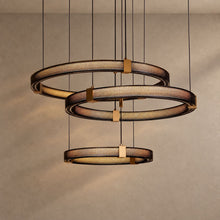 ORRIS on mushroom taupe background with natural shadows
