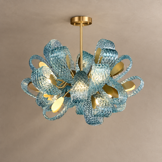 PAVO living room chandelier with teal textured glass leaves and brass fittings on mushroom taupe plaster