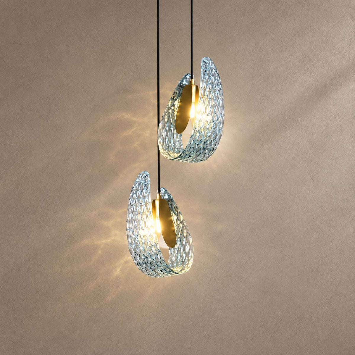 PAVO (PENDANT) lighting on a mushroom taupe background with natural shadows