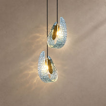 PAVO (PENDANT) lighting on a mushroom taupe background with natural shadows