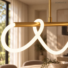 SELIA close-up of the gold cylindrical frame, suspension connector and continuous flexible LED tube