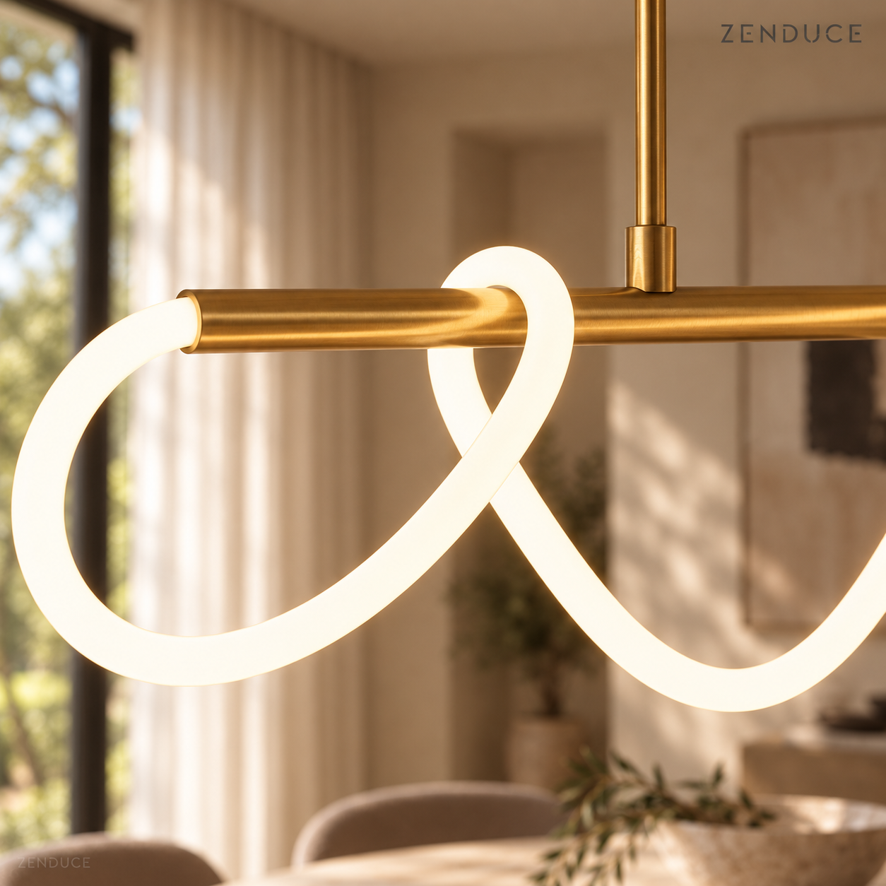 SELIA close-up of the gold cylindrical frame, suspension connector and continuous flexible LED tube