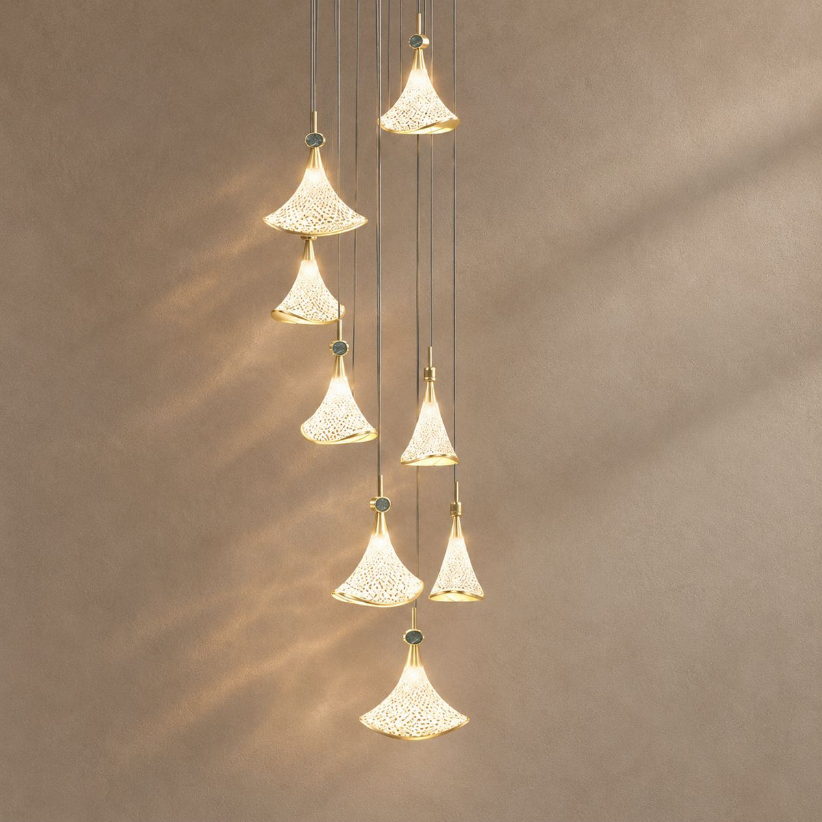 SHELL lighting on a mushroom taupe background with natural shadows
