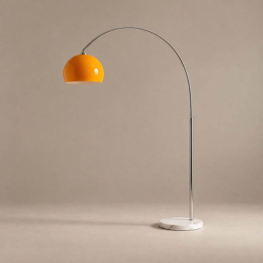 SILENNA orange glass dome arc floor lamp on a mushroom taupe background with natural shadow