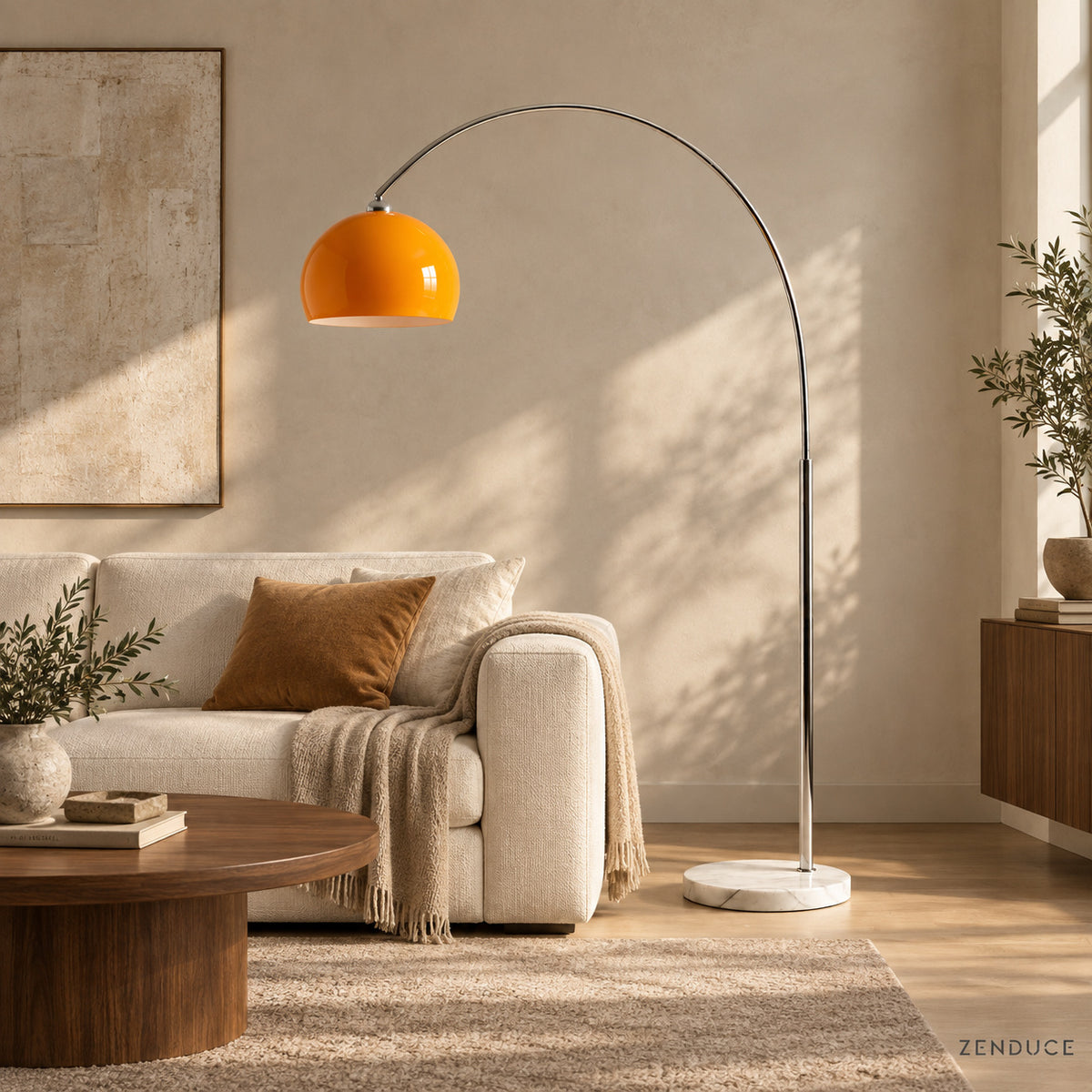 SILENNA orange arc floor lamp visualized beside an ivory sofa in a warm living room