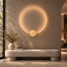 SOLIA black large circular LED wall light with gold mounting disc