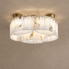 SOLIS scalloped alabaster flush mount ceiling light with gold-finish fittings, lit