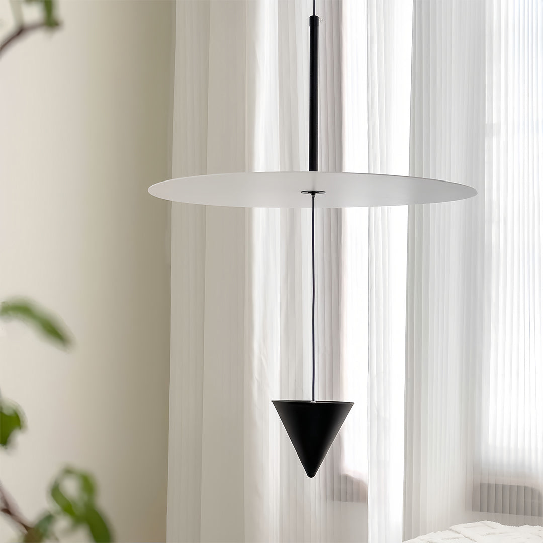 CONIA - White disc and black cone pendant beside sheer curtains