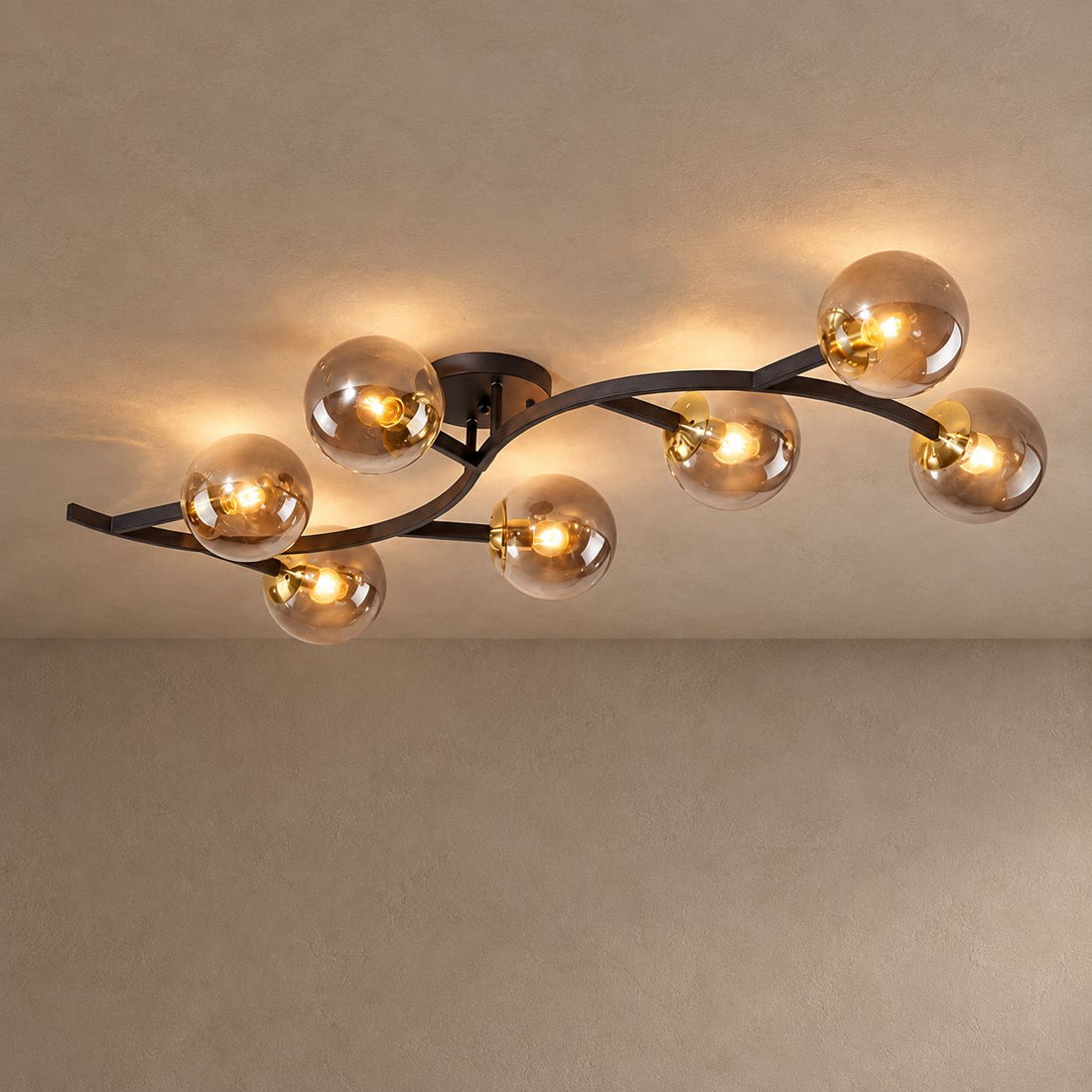 SPRIG lighting on mushroom taupe plaster with natural shadows